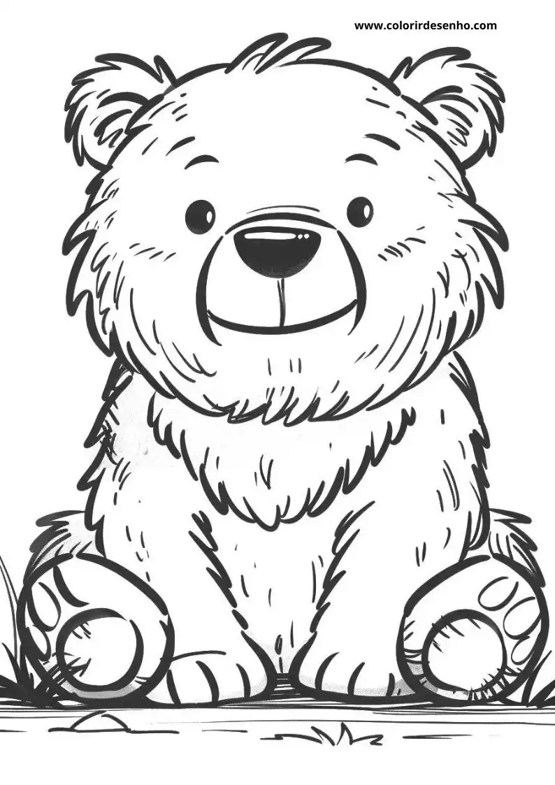 bear sitting on grass holding ball in paw