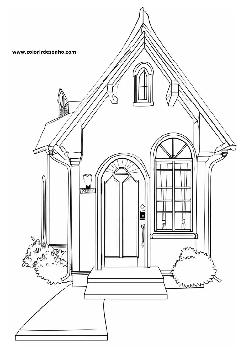 house has a quaint victorian style cottage with an arched front door and decorative