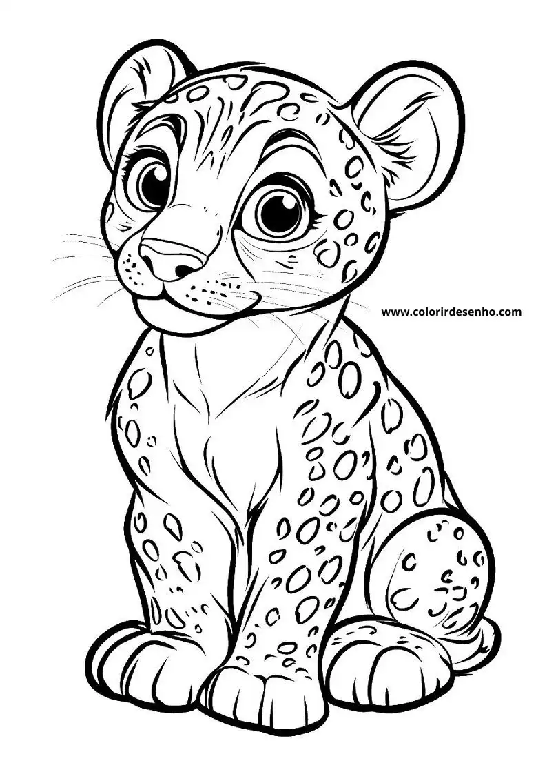 jaguar cub sitting and looking alert in a natural setting