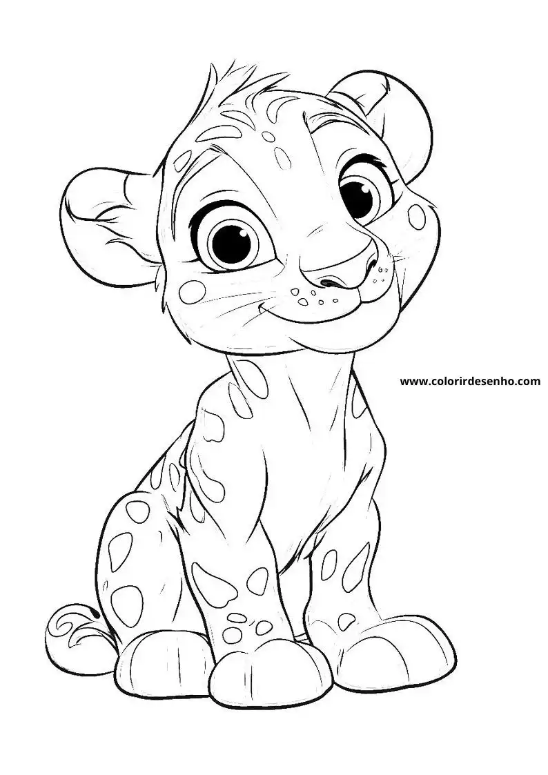 jaguar cub sitting straight with large eyes and spots on body tail coiled up