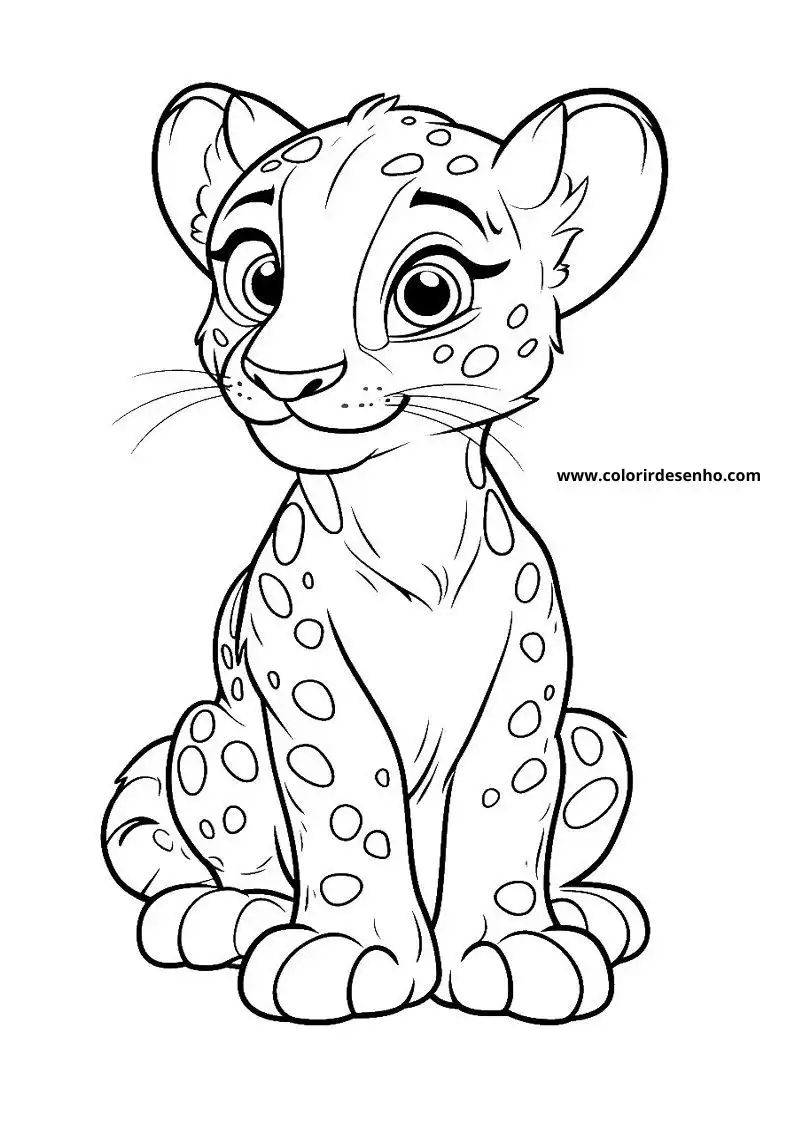 jaguar cub sitting upright smiling with spotted fur looking playful