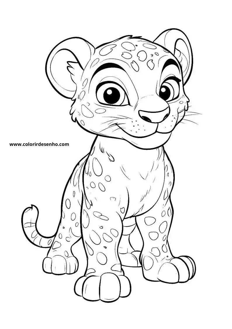 jaguar cub standing alertly looking to side