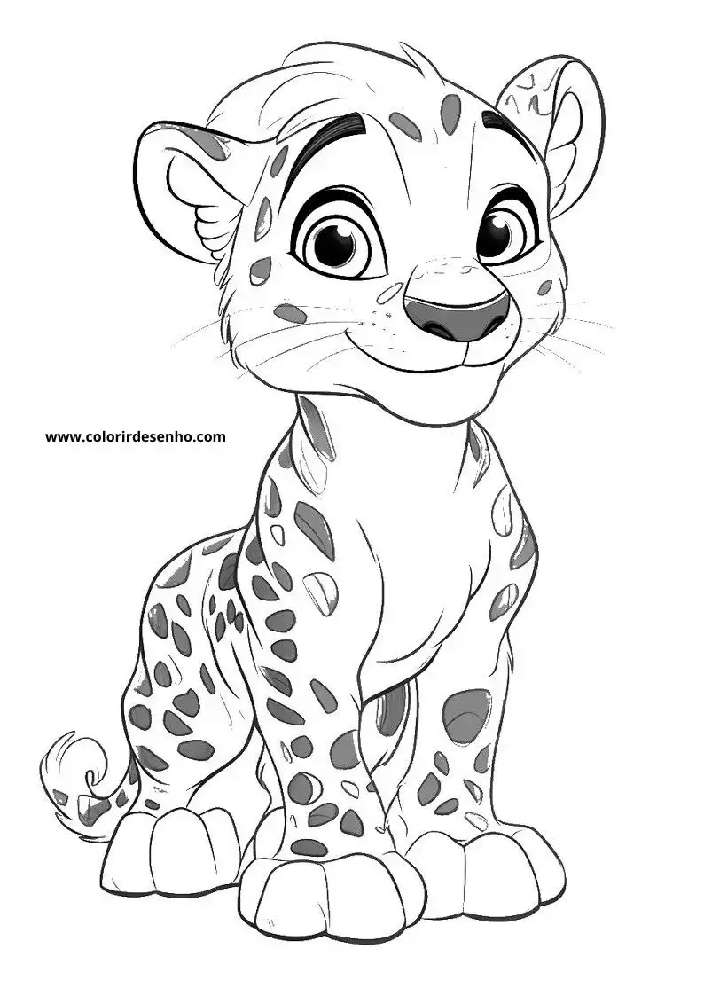 jaguar cub standing upright with big eyes looking alertly