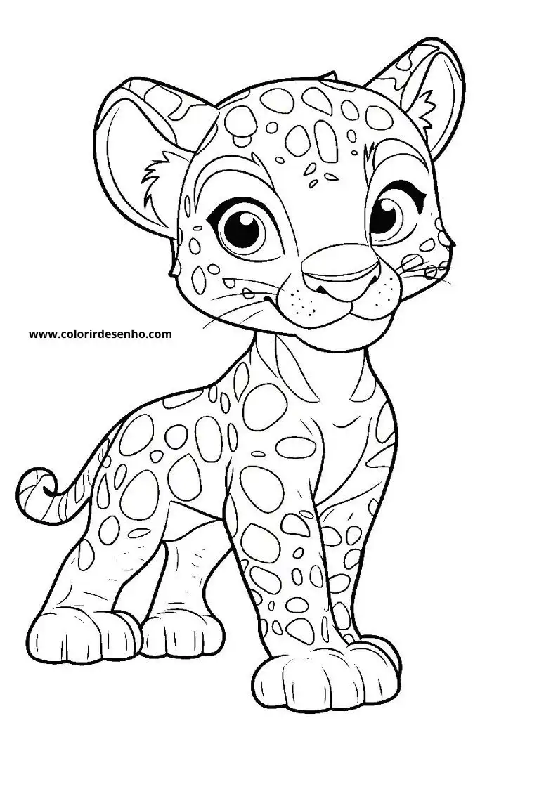 jaguar cub standing upright with spotted fur and big eyes looking playful
