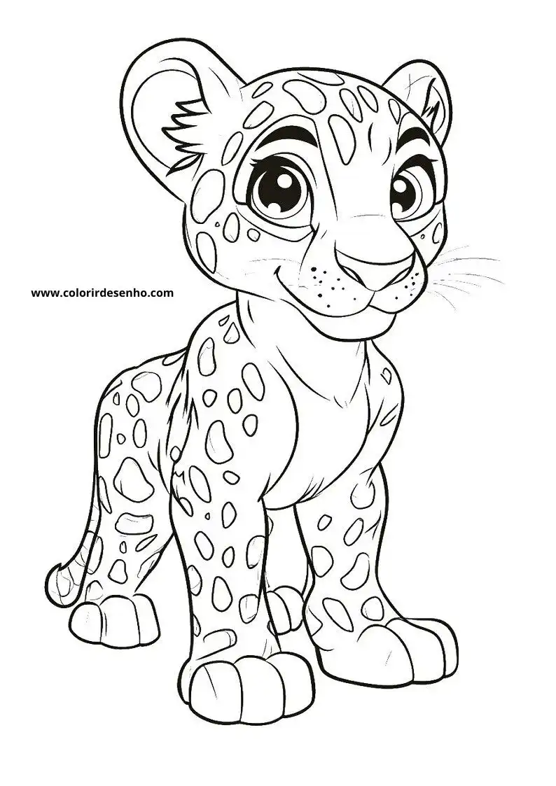 jaguar cub standing upright with spotted fur looking playful