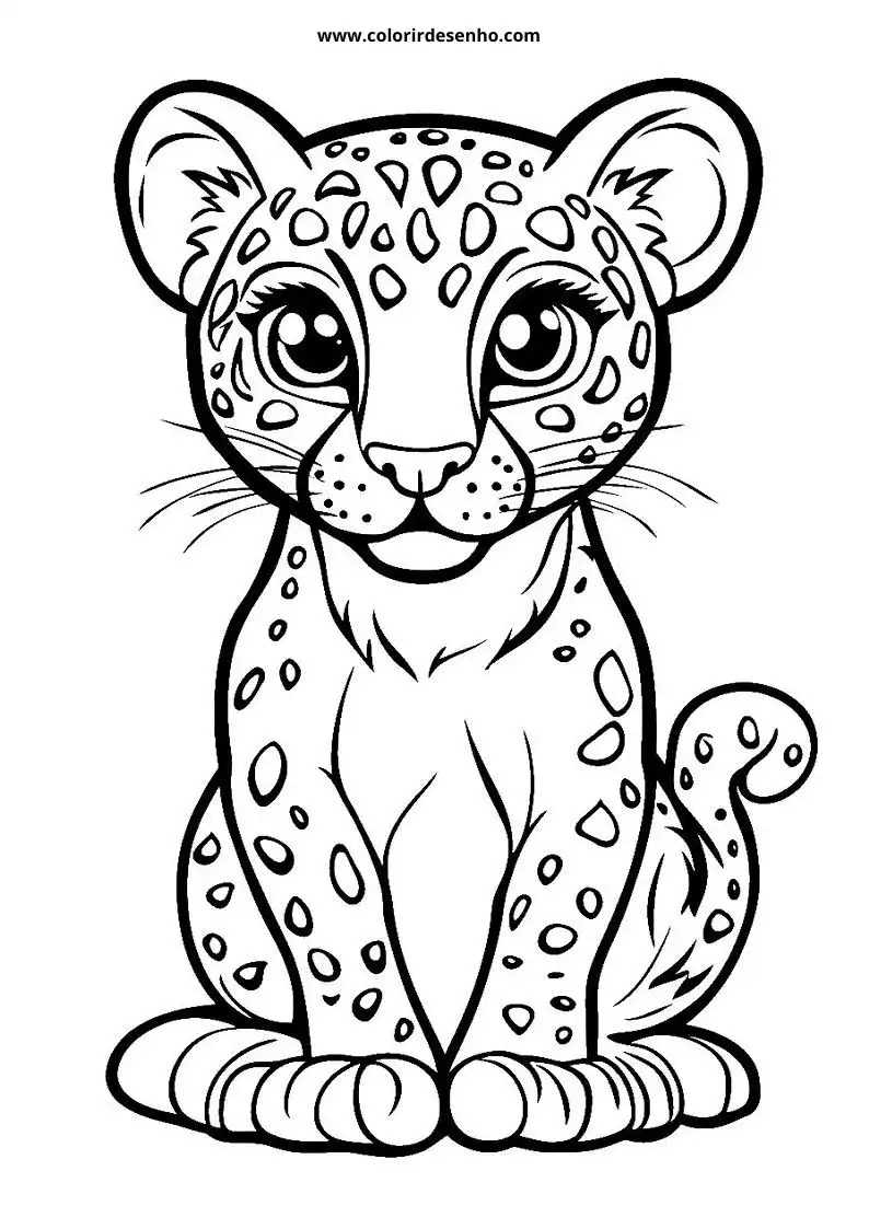 jaguar sitting on branch looking alert spots visible