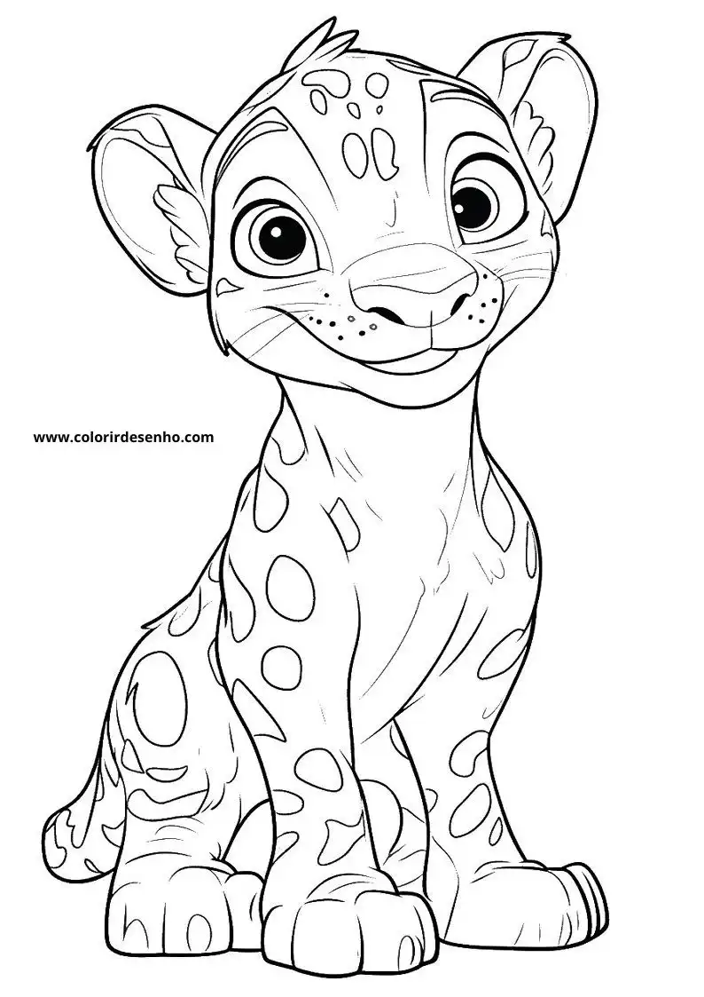 jaguar sitting with spotted fur looking alertly at viewer